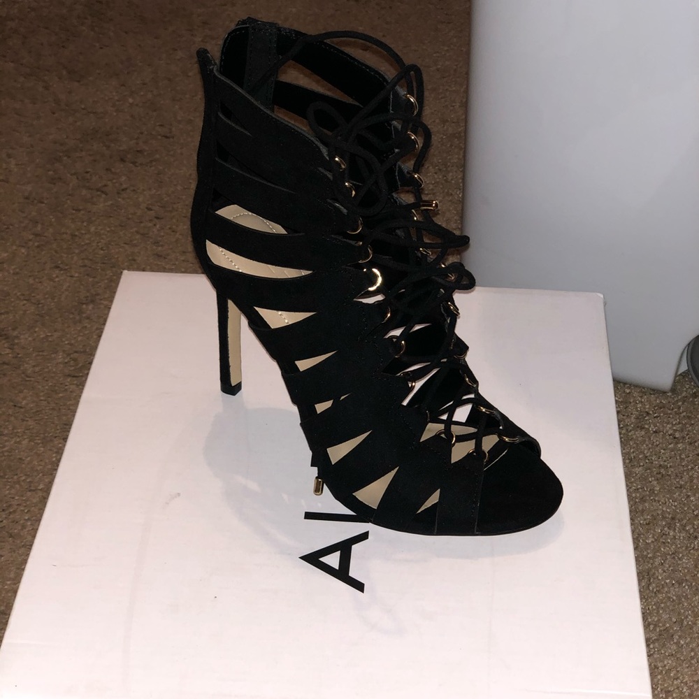 Aldo strappy sandal. Never worn. 4 inch heel.